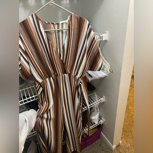 Rust, navy, and white jumper. From Blu Pepper size large.